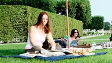 people sitting in the shade