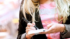 Woman reading travel guide